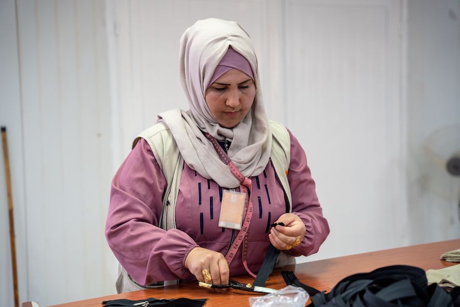 A woman tailoring.